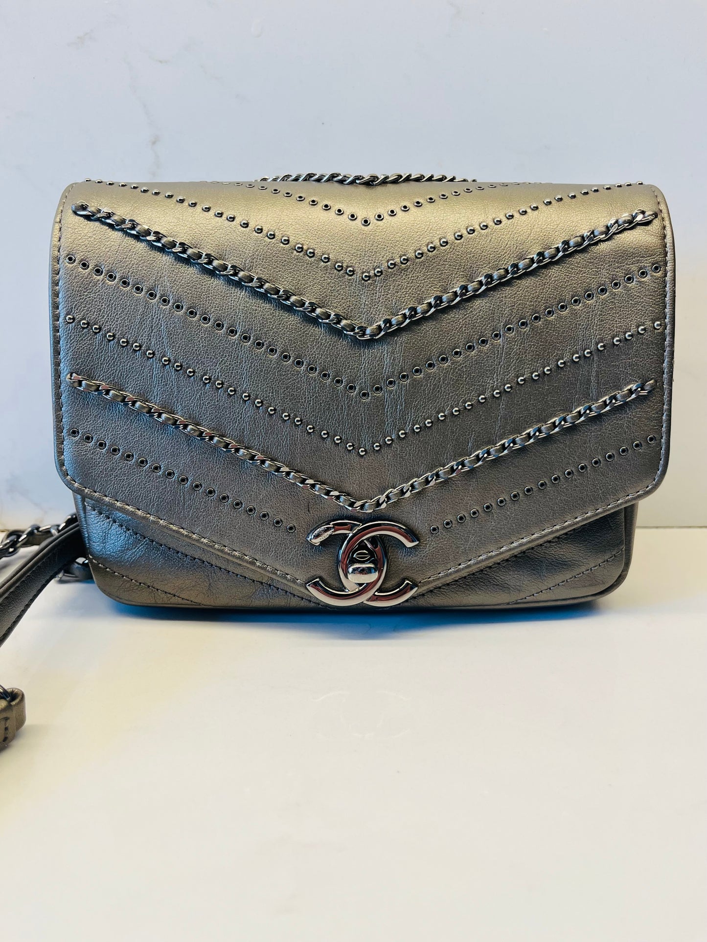 CHANEL chevron flap square embellished