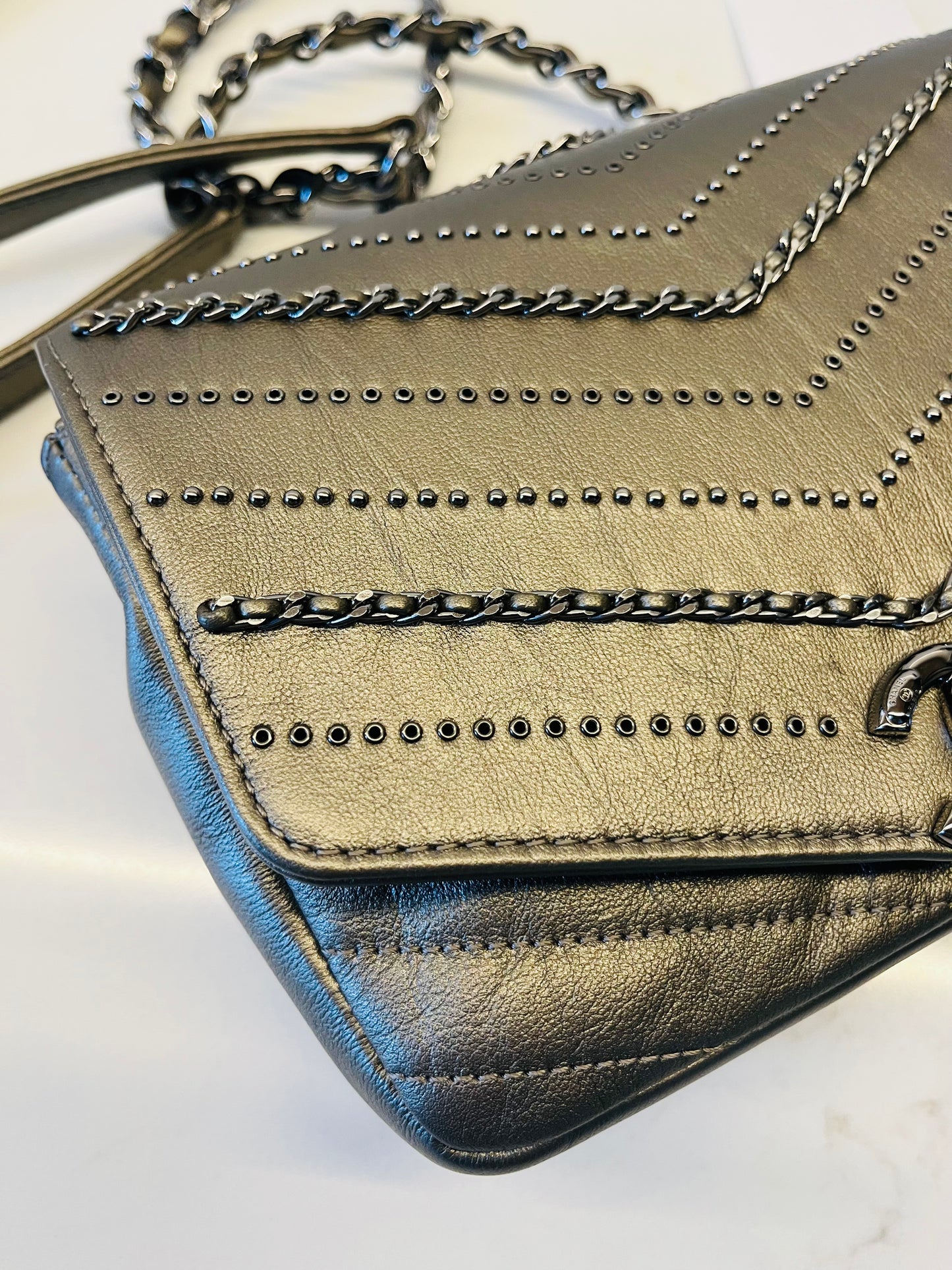 CHANEL chevron flap square embellished