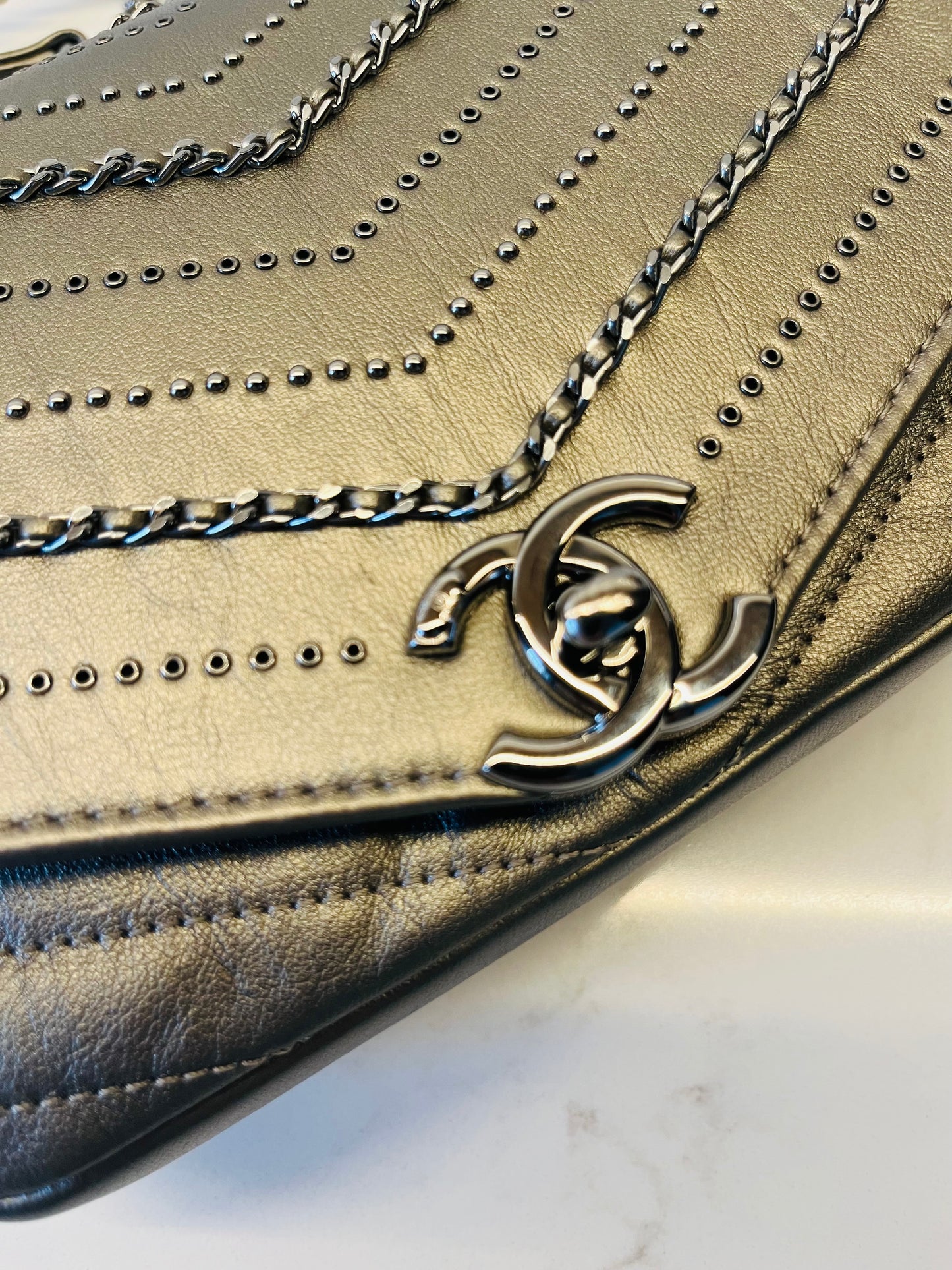 CHANEL chevron flap square embellished