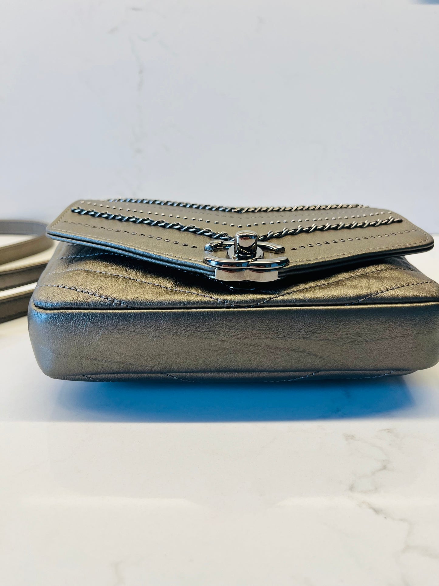 CHANEL chevron flap square embellished