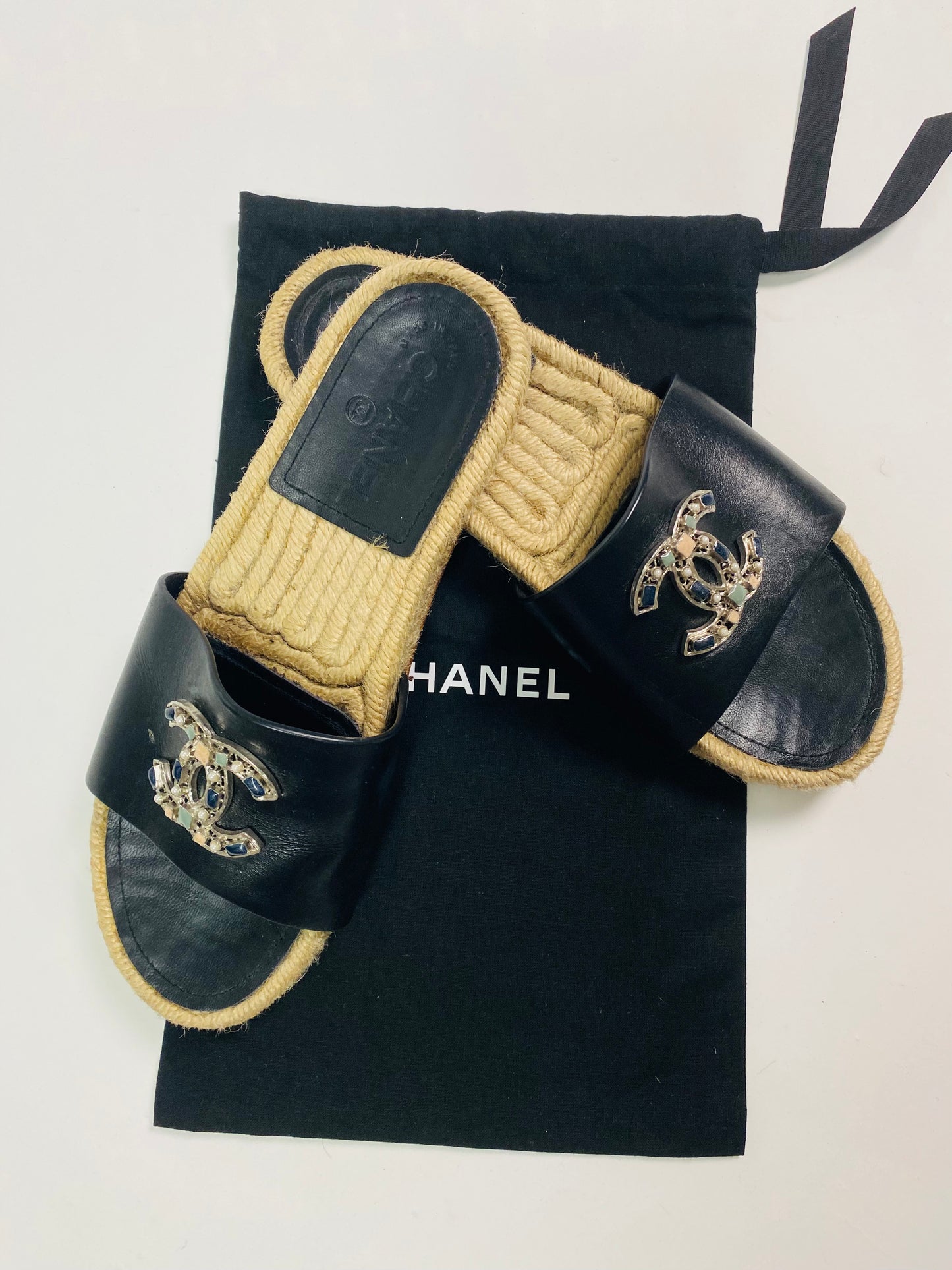CHANEL woven slides