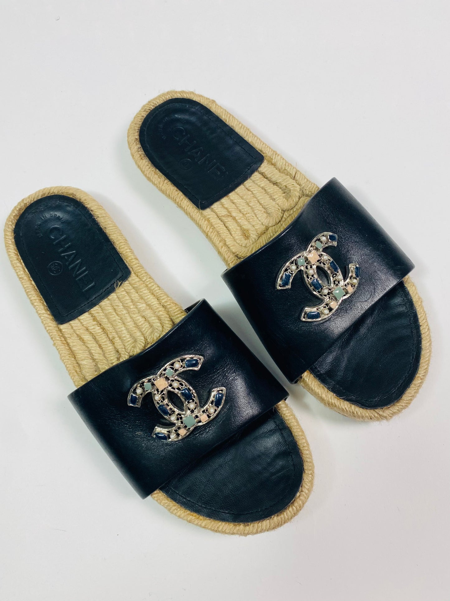 CHANEL woven slides