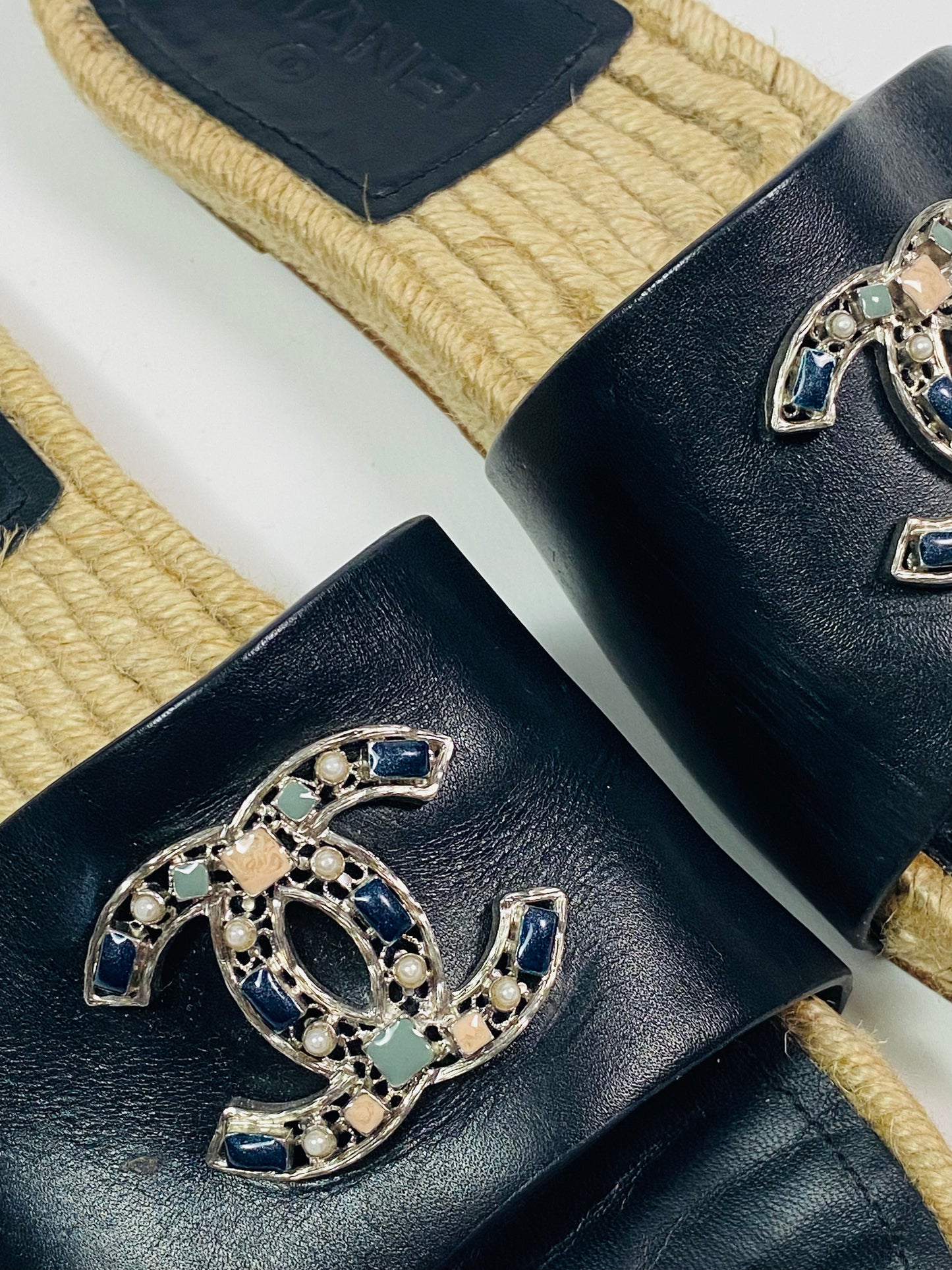 CHANEL woven slides