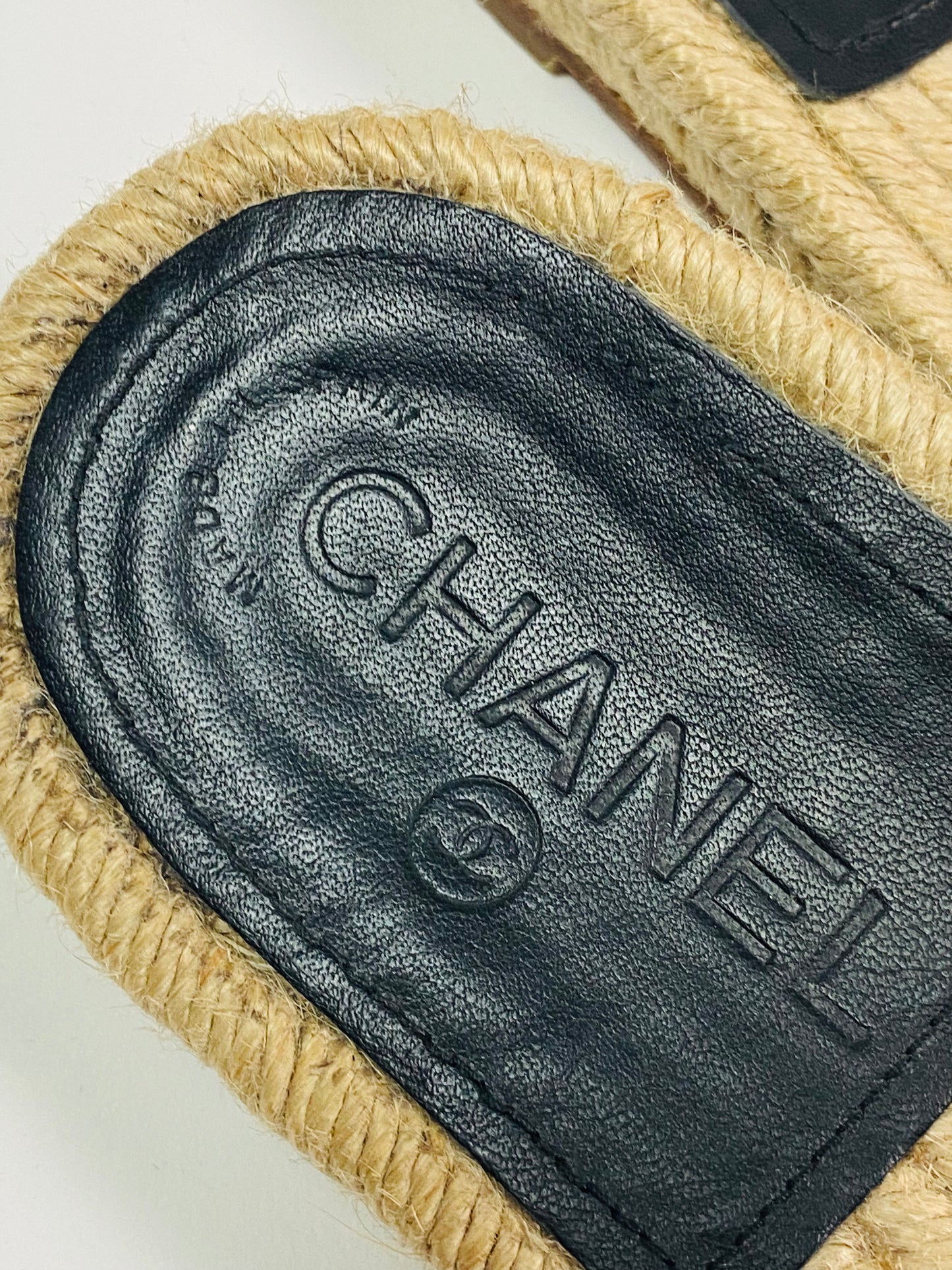 CHANEL woven slides