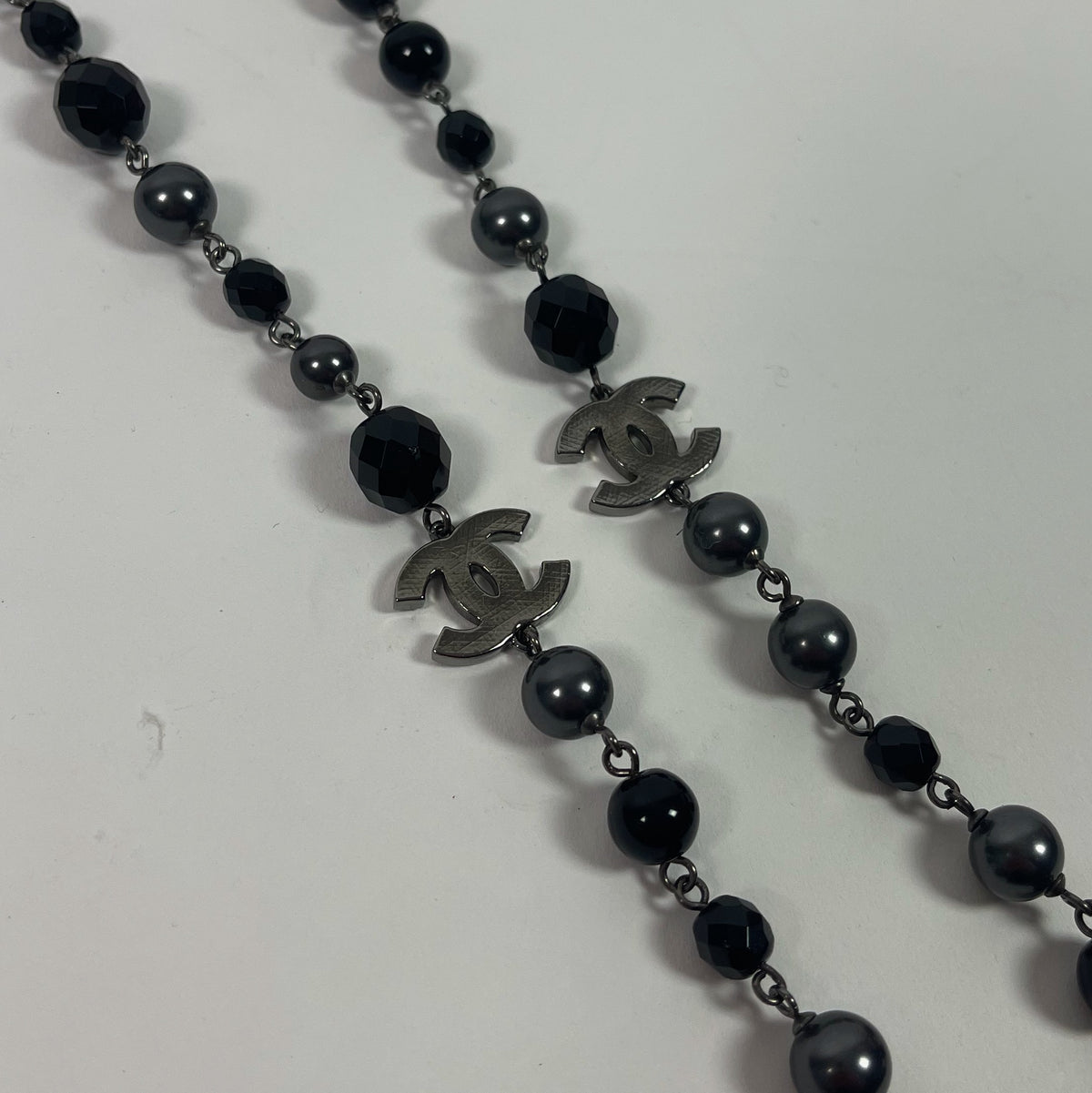 CHANEL coco black and silver long necklace