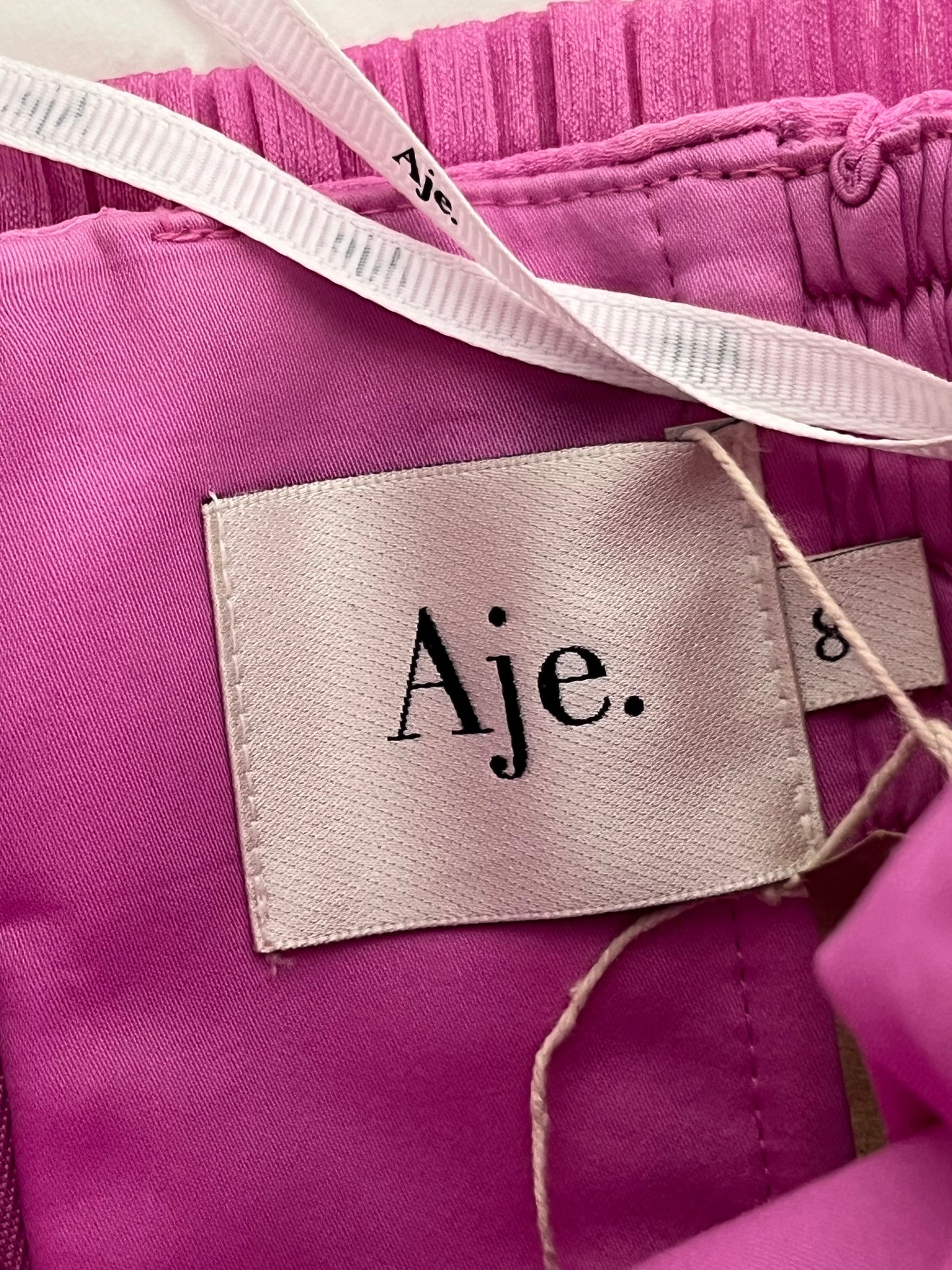 Aje fuschia pink strapless dress
